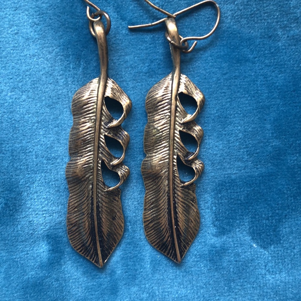 Boho feather earrings $5 add on to purchase